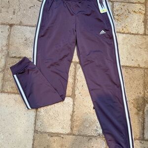 Adidas Women's Purple Joggers with White Stripes